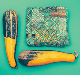 Set in oriental style. Ornament and zucchini on blue background