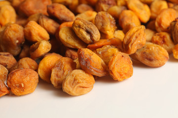 Dried apricots with pits in
