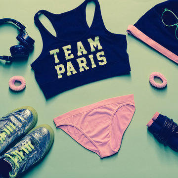 Fitness Glamorous Style. Sports Accessory Set On Green Backgroun