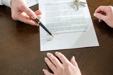 Realtor showing the signature place of a contract