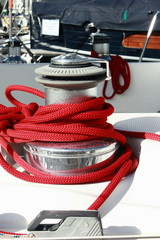 sailing Yacht Winch with red rope	