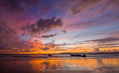 Fototapeta na wymiar Tropical sunset on the beach. Ao-Nang. Krabi