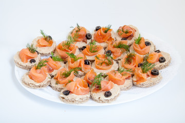 party platter with sandwiches with salmon