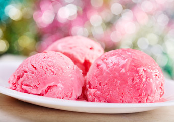 scoops of strawberry ice cream