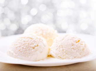 Fototapeta na wymiar scoops of vanilla ice cream