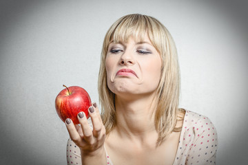 Blonde Girl with Apple