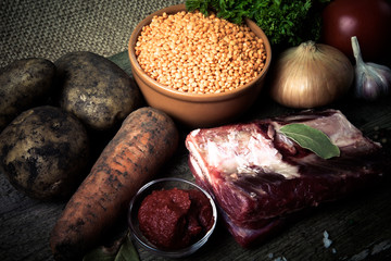 Ingredients for Turkey vegetable soup with red lentils, lying on