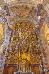 Seville - The main altar in baroque Church of El Salvador