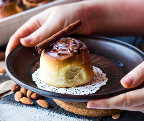 hold in your hand with the Cinnabon cinnamon rolls and cream sau