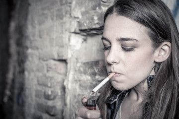Beautiful young girl smooking