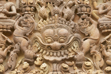 Stone carving at Prasat Sikhoraphun temple, Surin, Thailand.