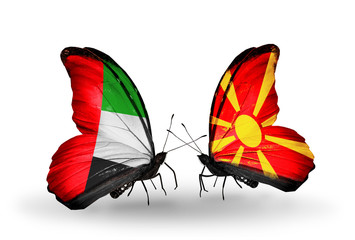 Two butterflies with flags  UAE and Macedonia
