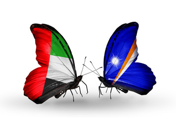 Two butterflies with flags  UAE and Marshall islands