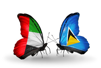 Two butterflies with flags UAE and Saint Lucia
