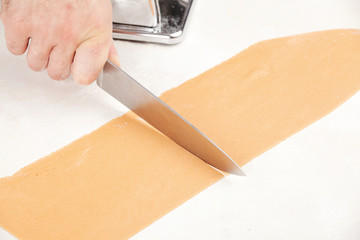 cutting dough for pasta