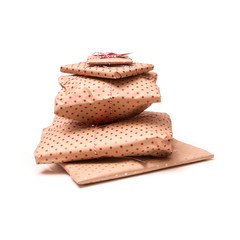 Gift wraped parcels or presents isolated on a white studio backg