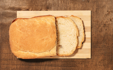 Freshly baked bread on the wooden board