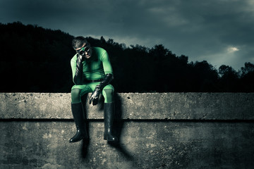 Pensive green superhero © stokkete