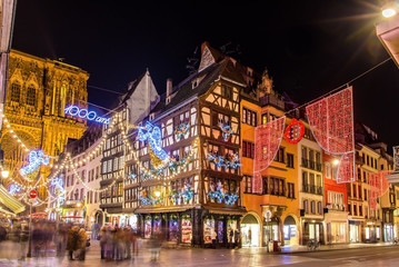 Buildings near the Cathedral in Strasbourg before Christmas - obrazy, fototapety, plakaty