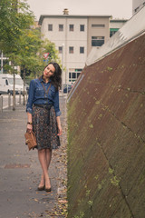 Pretty girl posing in the city streets