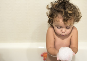 Little girl in the bathtub