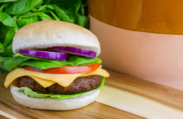 Juicy Aberdeen Angus burger on oak board