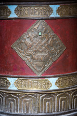 Buddhist prayer wheels in Tibetan monastery. India, Ladakh