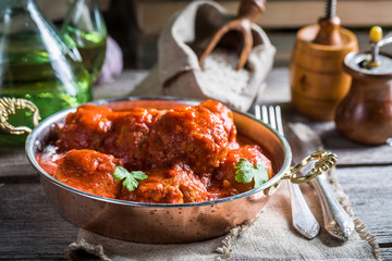 Hot homemade meatballs with tomato sauce