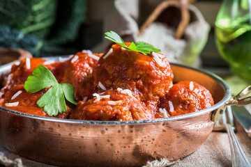Closeup of meatballs in tomato sauce
