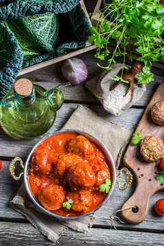 Meatballs with tomato sauce and parsley