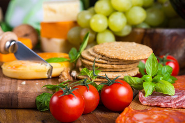 antipasti selection on wooden board