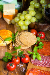 antipasti selection on wooden board