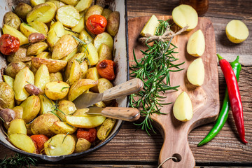 Closeup of baked potatoes with rosemary