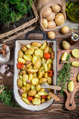 Freshly baked potatoes with rosemary and garlic