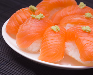 sushi with wasabi on white dish