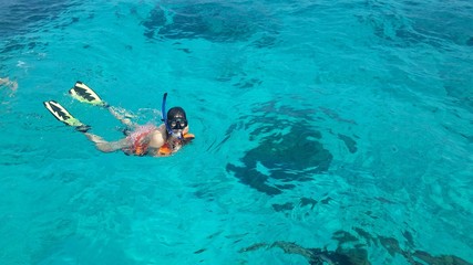 Woman snorkeling in the sea Thailand