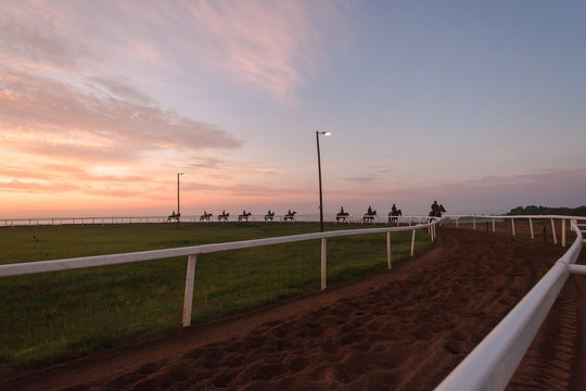 Race Horses Riders Sand Track Silhouetted