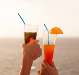 couple toasting with cocktail