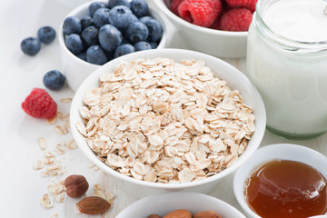 cereal and various delicious ingredients for breakfast, close-up