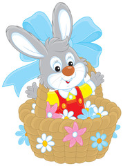 Easter Bunny in a basket with flowers