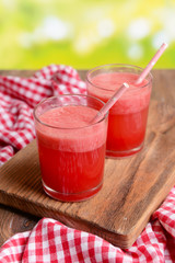 Juicy watermelon on table on bright background