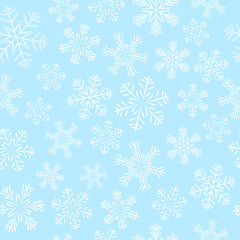 Seamless pattern with white snowflakes