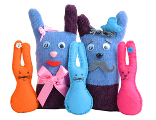 Cute handmade toys of gloves isolated on white