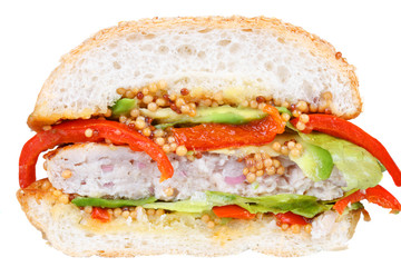 Burger with turkey and avocado. Isolated on white background