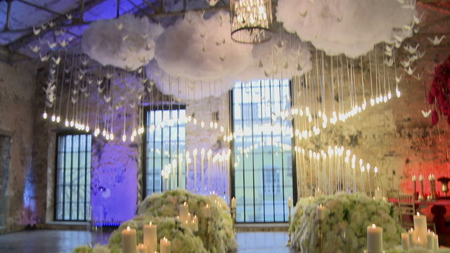 Hall for wedding ceremony decorated with flowers