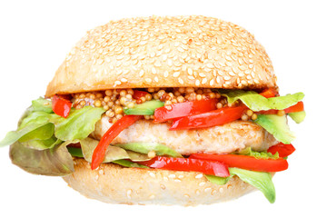 Burger with turkey and avocado. Isolated on white background