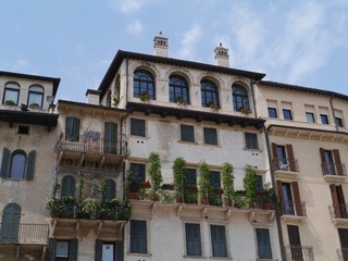 Fototapeta na wymiar A balcony of an ancient house in Verona in Italy