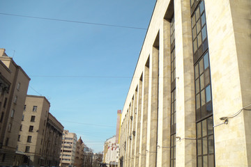high gray building of stone and glass