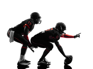 Fototapeta na wymiar two american football players on scrimmage silhouette