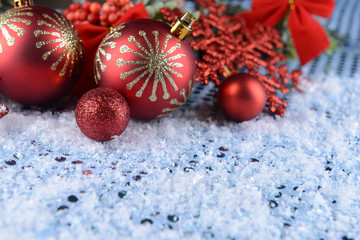 Christmas composition on snow close-up